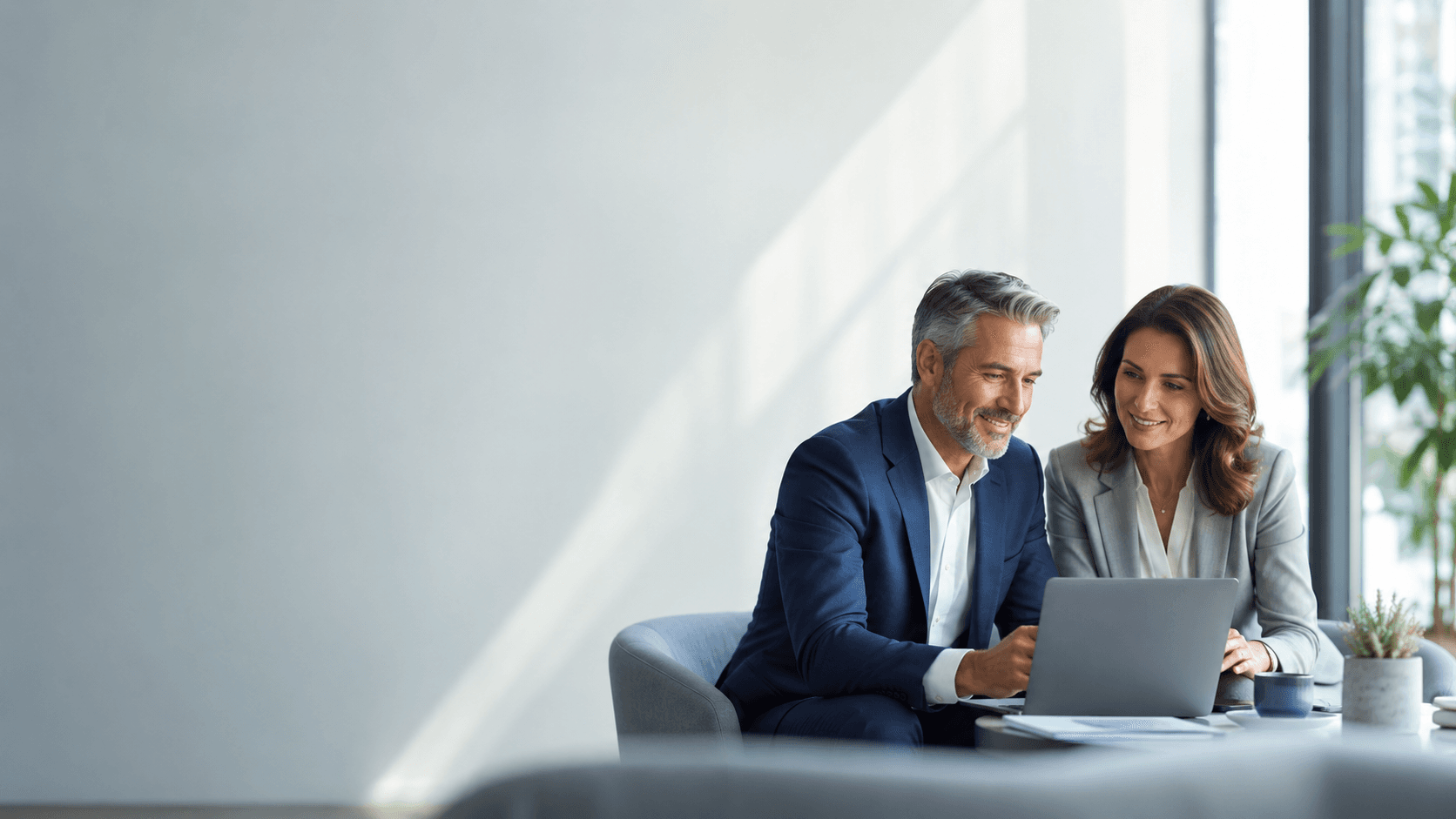 Two professionals reviewing work together — humans stay in control