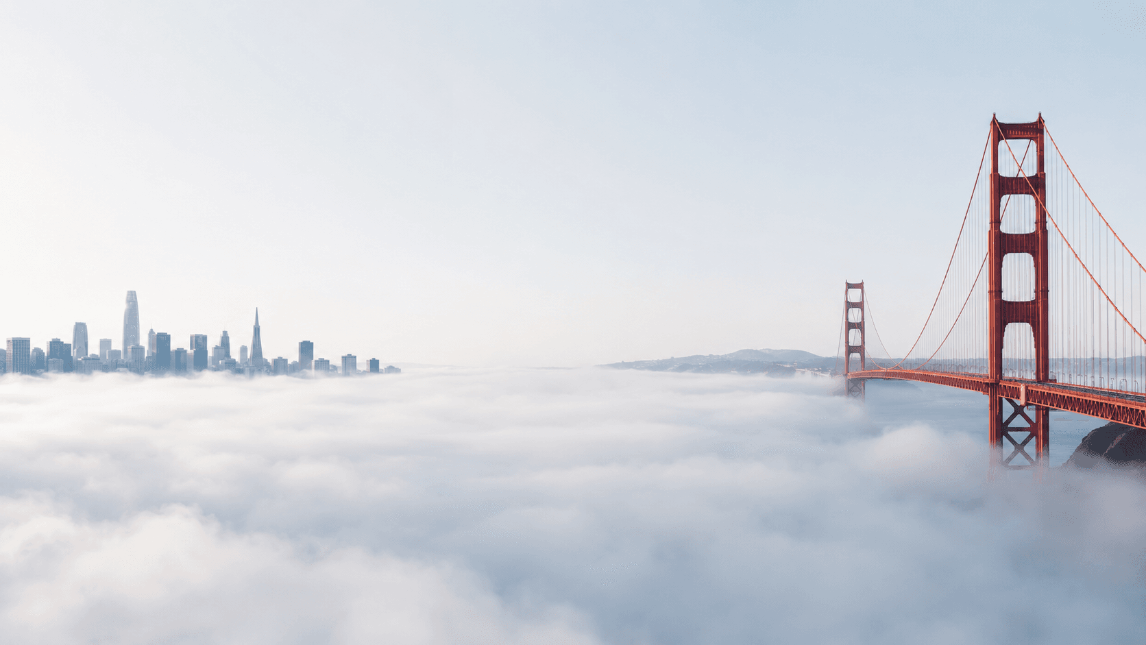 Golden Gate Bridge emerging from fog — the bridge from administrative drag to operational clarity
